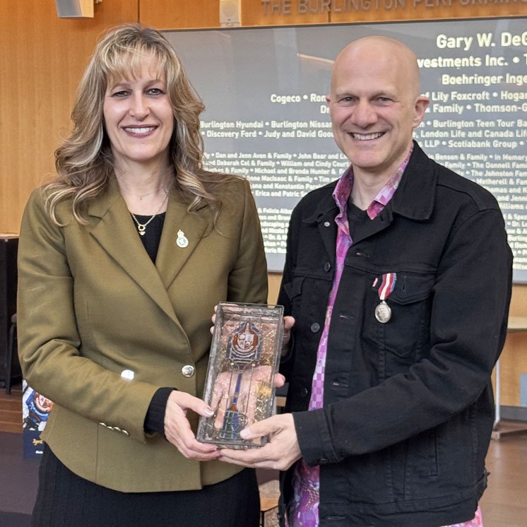 Chris McKhool - April 2025 Chris McKhool receiving key to the City